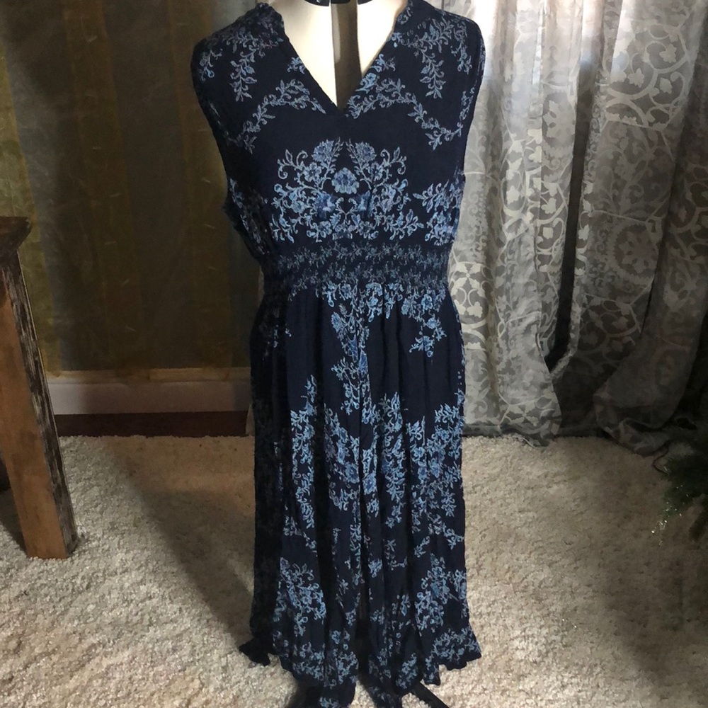 Blue dress with floral and vine design